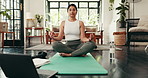 Calm, meditation and woman with laptop, house and listening to ambient music, living room or chakra. Home, person and zen with sound in lounge, peace and girl with mindfulness app, relax or breathing