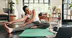 Stretching, fitness and laptop with woman at home for online class, digital gym membership and workout. Wellness, warm up and virtual exercise with person on floor of living room for yoga and health