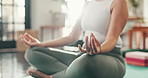 Home, hands and yoga with chakra for fitness, mindfulness and inner peace with zen in apartment. Closeup, woman and female yogi with namaste for holistic wellness, lotus pose or meditation in morning