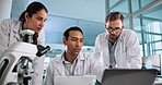 Group, scientist or people on laptop for science breakthrough, clinical trial or discovery. Low angle, medical team and checking results on technology for vaccine research, cure or development in lab