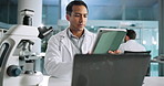 Microscope, scientist and man on tablet for test, experiment results and innovation in lab. Microbiology, biotechnology and science professional with medical study, development or research at night