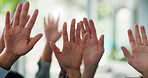 Raised hand, answer and crowd at office, meeting or gesture for question, team building or staff training. Business people, audience and discussion in office for problem solving at financial workshop