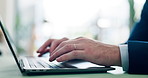 Hands, typing and man with laptop, keyboard and deadline for tax report with research for stock market. Closeup, person and investment banker in office, pc and financial news with email and feedback