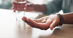 Hands, pills and person drinking water for healthcare, wellness and daily medical antibiotic in home. Medicine, closeup and drugs for prescription treatment, pharmaceutical supplements and vitamins