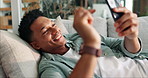 Dating app, phone and relax with man on sofa in living room of home for communication. Contact, smile and social media with happy person in apartment for connection, notification or online chat