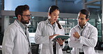 Scientist, teamwork and discussion with tablet in laboratory for pharmaceutical review, medical research or innovation. Night, people and clinical analysis of science data, study results and advice