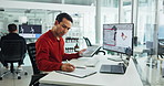 Engineer, tablet and man writing in office with map for wind turbine, checklist or renewable research notes. Monitor, worker or global planning on technology, sustainable data or clean energy analyst