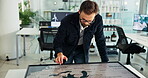 Business, man and interactive display with map in office of global selection, location and wind turbine project. Person, worldwide screen and sustainable planning, windmill production and site choice