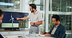 Presentation, meeting and business man with windmill in office for sustainability, innovation and renewable energy. Climate change, power farm and workers with wind turbine for electricity production