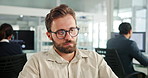 Business, glasses or man with laptop in corporate office for online system, banking update or email. Eyewear, banker and technology in financial agency for equity, stock or investment growth research