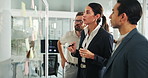 People, woman leader and sticky notes on glass for timeline, strategy and brainstorming in workshop. Female speaker, presentation or group training in office for idea, collaboration or instruction