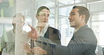 People, discussion and team at glass for planning, feedback and brainstorming at sticky notes. Employees, business and meeting in office for to do list, workflow agenda or question for new schedule