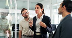 People, feedback or team at window for planning, collaboration or brainstorming at sticky notes. Employees, business or meeting in office for to do list, workflow agenda or question for new schedule
