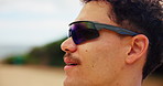 Fitness, sunglasses and face of man in nature ready to start exercise, training and workout for marathon. Sports, eye protection and person with frames for wellness, health and challenge outdoors