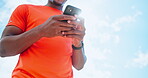 Runner, outdoor or phone in hands with fitness for checking workout progress, tracking exercise or tutorial. Wellness, low angle or athlete on mobile app for online running route, map and navigation