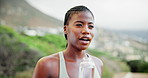 Fitness, drinking water and black woman with bottle in nature for training, workout and exercise. Sports, runner and thirsty person resting for wellness, health and minerals for hydration outdoors