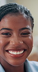 Black woman, face and smile at office in closeup, confidence and pride for career at company. Happy business person, portrait and African writer with job, excited and creative agency in Nigeria