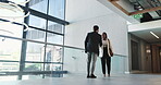 Handshake, partnership and welcome with business people in hallway of convention center for meeting. Friendly greeting, hello and smile of employee people shaking hands at conference for partnership
