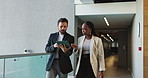 Tablet, walking and business people in office for conversation, planning or help with investment. Technology, team collaboration and discussion for financial news, economy or brainstorming solution