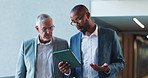 Tablet, walking and business team in discussion, planning or help with investment in office. Technology, collaboration and conversation with men for financial advice, coaching or training with mentor