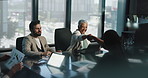 Meeting, handshake and business people in office, planning and feedback for stats. Group, partnership and employees with financial advice, shaking hands and laptop with negotiation and company merger