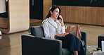 Business, phone call and tablet with woman on chair in office for communication or planning. Conversation, lobby and research with happy mature employee in workplace for negotiation or update