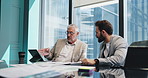 Tablet, mentor and business men talking for financial training, planning and discussion. Teamwork, technology and manager coaching intern in office for investment meeting, help and project feedback