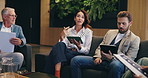 Meeting, tablet and training with business people in lobby of office for discussion or planning. Coaching, collaboration and conversation with employee people in workplace for report or research