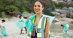 Face, ocean and woman with trash bag, teamwork and sustainability with earth day, climate change and smile. Portrait, happy person and volunteer with plastic collection, waste management or seaside
