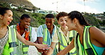 Group, volunteering or people in huddle on beach for cleaning, conservation or environmental activism. Charity, helping or happy friends on seaside coast for community service, achievement or success