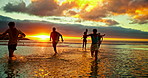 People, sunset and friends running on sea water for adventure, freedom and celebration with energy. Beach, ocean race and group trip outdoor for summer vacation, travel and holiday to splash at dusk