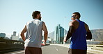 Men, back and running on bridge for exercise with training for marathon, competition or race in city. Athlete, friends and together for workout, challenge or happy for fitness on urban road in summer