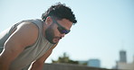 Man, fitness and tired with breathing in city, sunglasses and workout with break in summer. Person, athlete and exhausted with fatigue, burnout and rest with training for marathon in Cape Town