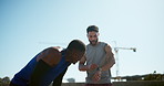 Running, men and friends with watch, check time and jogging for exercise with fitness. City, athlete and runner with break for workout, training and wellness for healthcare endurance challenge