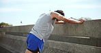 Man, stretching legs and bridge in city, outdoor and ready for sport, challenge and workout in summer. Person, athlete and warm up for muscle wellness, strong and fitness with training for marathon