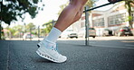 Fitness, training and feet stretching legs in city, getting ready for exercise or workout for cardio. Runner, woman and warm up for confident young athlete in urban town for sports and marathon goals