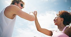 Below, high five and interracial couple for fitness, exercise and training for bonding. Celebration, support and man with woman for runner, workout and wellness for health and marathon endurance