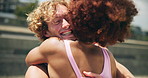 Happy, love and interracial couple for fitness, exercise and training in town for bonding. Morning, support and man with woman for embrace, workout and wellness for health and marathon endurance