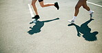 People, legs or running on road for fitness, cardio challenge or endurance workout for wellness. Urban, friends or shoes in city for practice, exercise or training for marathon or muscle development