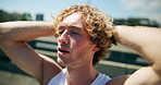 Break, fitness and man on bridge with sweat for running with race, challenge and marathon training. Breathing, tired and male athlete with cardio exercise or workout exhaustion in city with fatigue