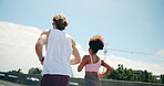 Back, couple and running for fitness on bridge for exercise, cardio and workout of marathon practice. Active, people and sports training for endurance performance, partner support and morning routine