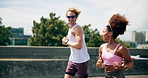 Interracial couple, athlete and running in city for workout, exercise or fitness together in urban town. Man, woman and training with cardio, sports or marathon for endurance and health or wellness
