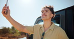 Man, phone and road trip with search for signal for contact, map or direction on holiday in countryside. Person, smartphone and car on rural road, mobile app and frustrated on vacation in Australia