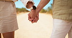 Holding hands, countryside or couple with love, closeup or romantic relationship for outdoor date. Nature, trip or man with woman, care and vacation for holiday travel, safari adventure or bonding