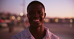 Face, smile and black man on beach outdoor for summer vacation, ocean travel and tropical island. Portrait, happy and person with holiday sunset, calm morning and weekend break for getaway in Florida