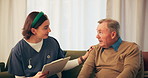 Home, old man and nurse with clipboard, support and discussion with routine checkup. Senior patient, medical and professional with documents, trust or healthcare with consultation, symptoms or report