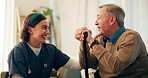 Nurse, home and conversation with senior man for help, support and community care. Medical, happy caregiver and talking to patient with disability, cane and rehabilitation for geriatric healthcare