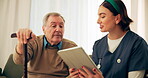 Home, senior man and nurse with tablet for consultation, diagnosis information or feedback on sofa. Healthcare, caregiver and patient with disability for arthritis update, walking stick or discussion