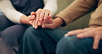 Support, senior patient and caregiver with holding hands for wellness, trust and empathy for illness. Closeup, old person and nurse with kindness, elderly care and console on sofa in retirement home