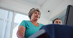 Treadmill, physiotherapy and help with old woman in clinic for heart rate, consulting and fitness report. Rehabilitation, cardio health stats and advice with people for low angle and patient results